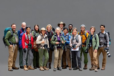 Diverse hikers group with backpacks and cameras