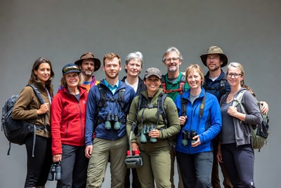 Group of birdwatchers with binoculars