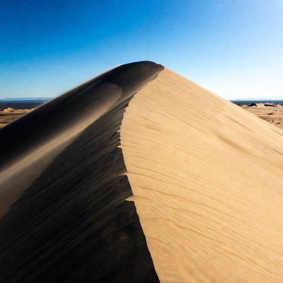 Tall Sand Dune in Desert