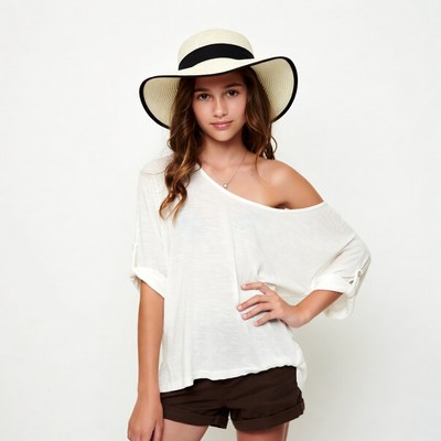 Girl wearing wide-brim hat and off-shoulder top