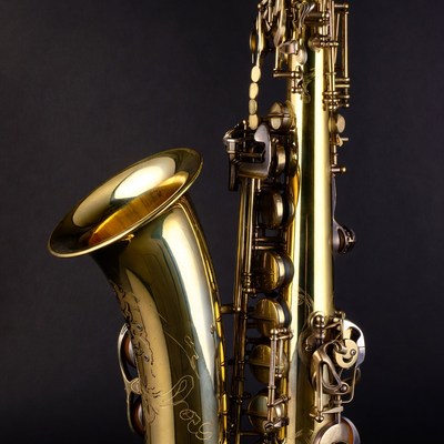 Shiny Gold Saxophone on Black Background