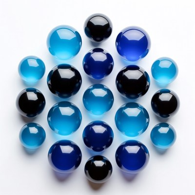 Blue and Black Glass Marbles on White