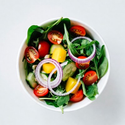 Fresh salad with mango and tomatoes