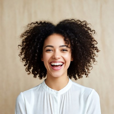 Smiling African-American woman with curly hair
