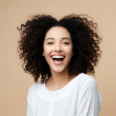 Smiling African-American woman with curly hair