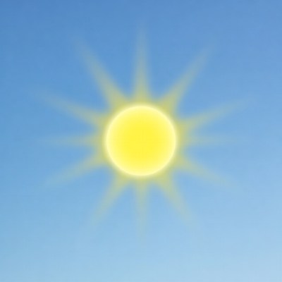 Bright yellow sun in blue sky