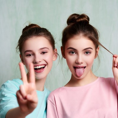 Two girls making funny faces