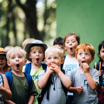 Group of surprised children outdoors