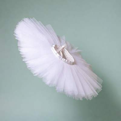 White tutu skirt on green background