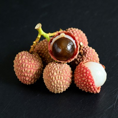 Fresh Lychees on Black Background