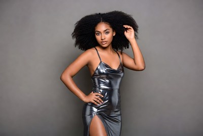 African-American woman in silver dress