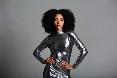 African-American woman in silver dress
