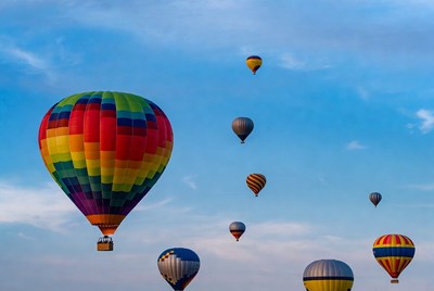Colorful hot air balloons in sky