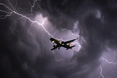 Airplane Flying Through Lightning Storm
