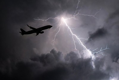 Airplane Flying Through Lightning Storm