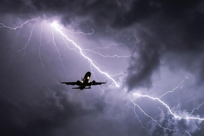 Airplane Flying Through Lightning Storm