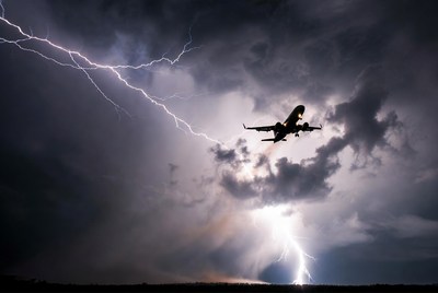 Airplane Flying Through Lightning Storm