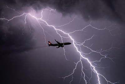 Airplane Flying Through Lightning Storm