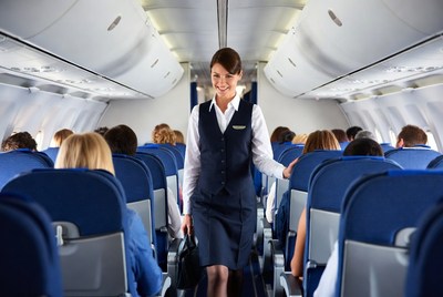Flight Attendant Walking Airplane Aisle