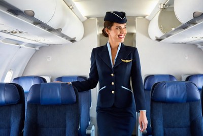 Flight Attendant in Airplane Cabin