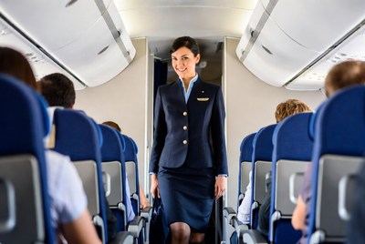 Flight Attendant Walking Airplane Aisle