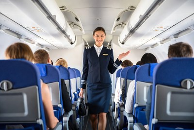 Flight Attendant Walking Airplane Aisle