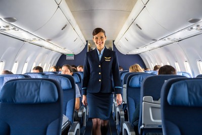Flight Attendant Walking Airplane Aisle