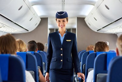 Flight Attendant Walking Airplane Aisle