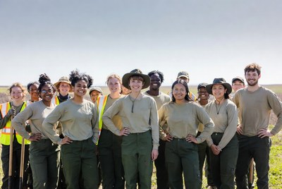 Diverse park rangers group outdoors