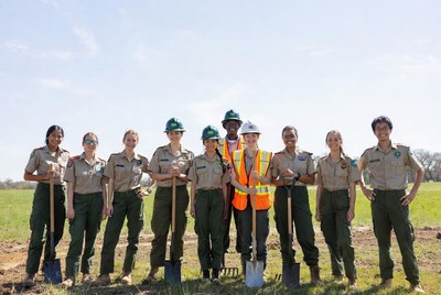 Group of park rangers with shovels