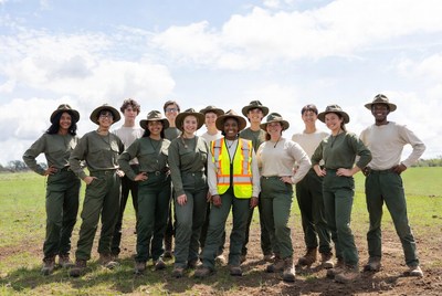 African-American group in safari uniforms outdoors