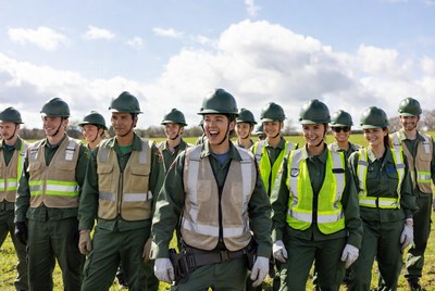 Construction workers in hi-vis vests outdoors