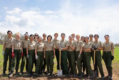 Girl Scouts Group Holding Shovels Outdoors