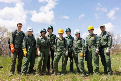 Forest Service Team in Green Uniforms Outdoors