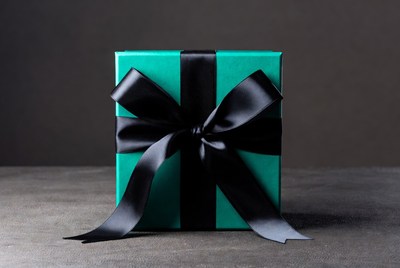 Turquoise gift box with black bow