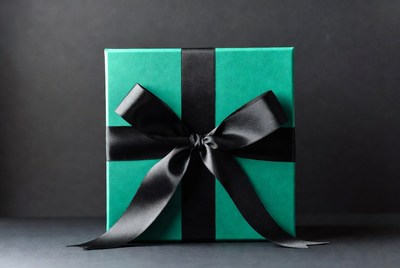 Teal gift box with black ribbon
