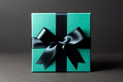 Turquoise gift box with black bow