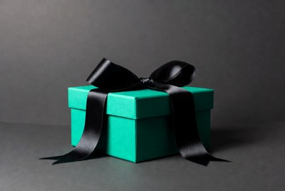 Turquoise gift box with black bow