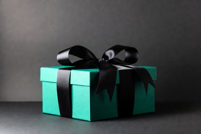 Teal gift box with black ribbon