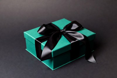 Teal gift box with black ribbon