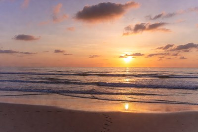 Sunset over ocean beach