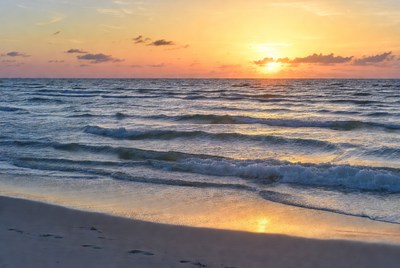 Sunset over ocean beach