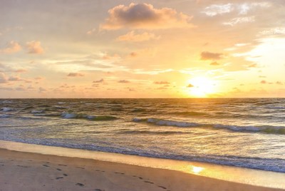 Sunset over ocean beach