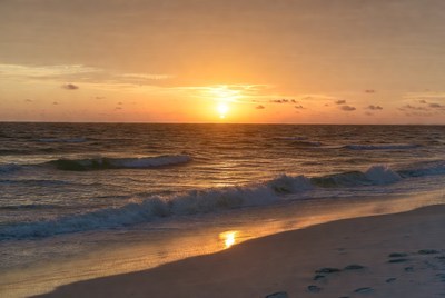 Sunset over ocean beach