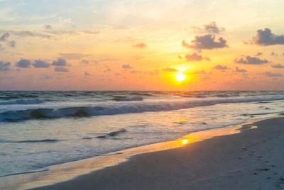 Sunset over ocean beach