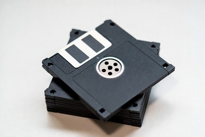 Stack of black floppy disks