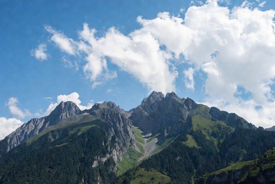 Majestic Mountains with Green Slopes