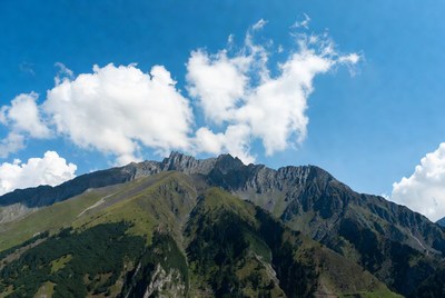Majestic Mountain Peaks with Clouds