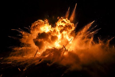 Massive fiery explosion at night