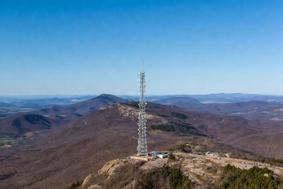 Tall Communication Tower on Mountain